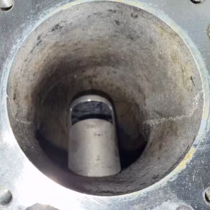 The same EGR port after cleaning by hand, the valve stem and port walls clear